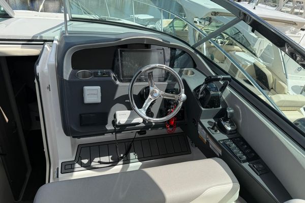 Spacious cockpit with comfortable seating and table.