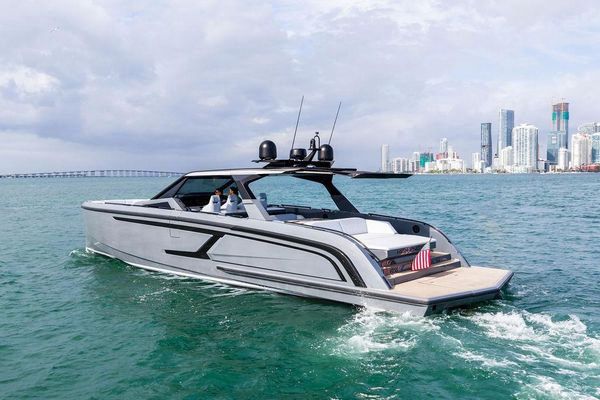 Sleek Porsche Slate Gray hull at anchor.