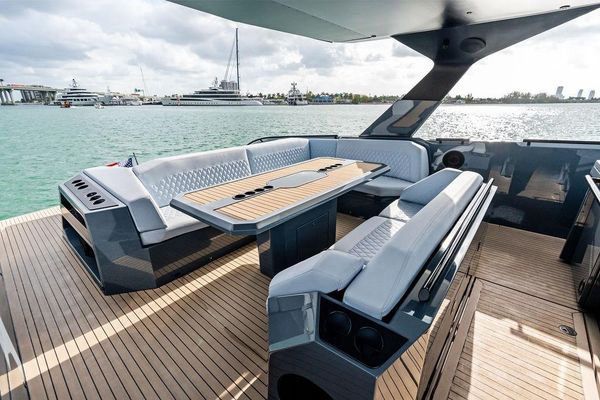 Hydraulic swim platform with teak flooring.