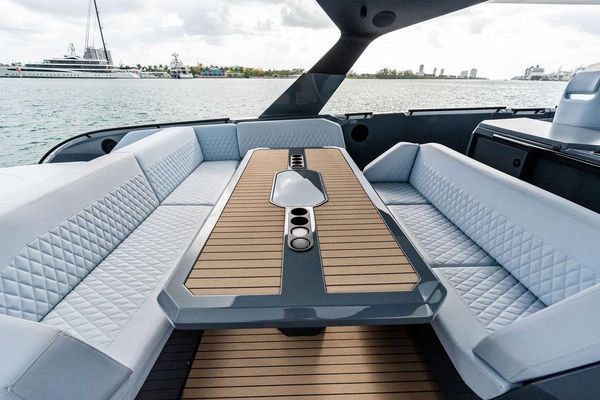 Spacious cockpit lounge with dining table.