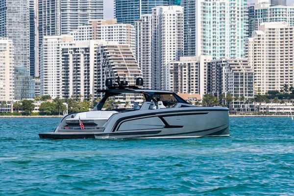 Drone view of the yacht cruising in open water.