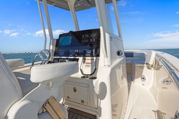Starboard side view of the boat in the water.