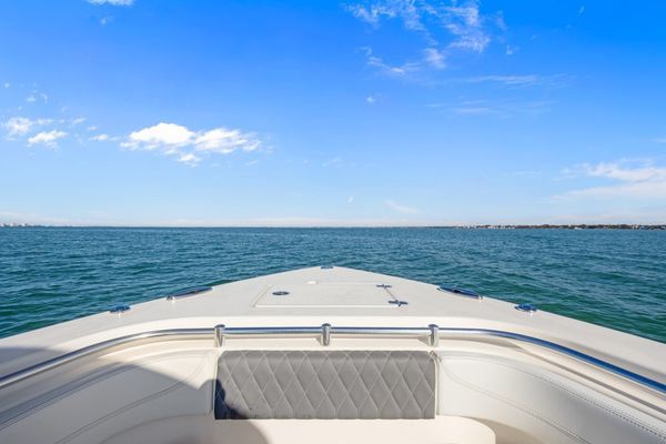 Spacious bow seating configured for entertaining.
