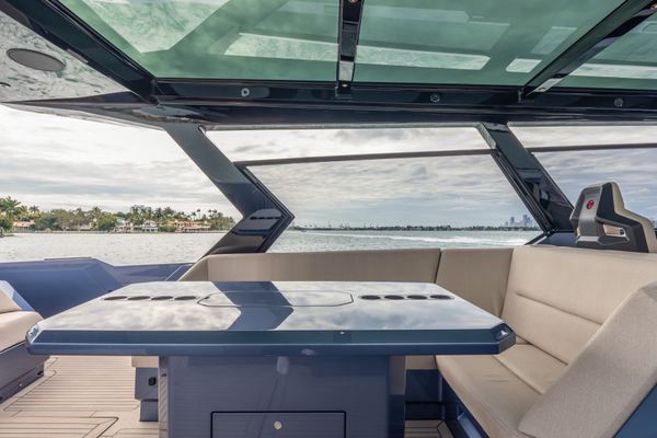 Triple Garmin screens and modern steering helm