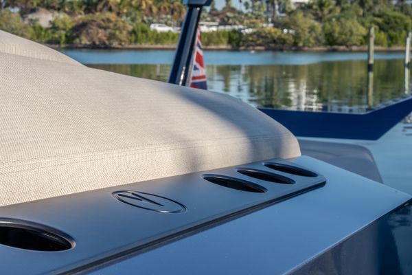 Overhead cockpit hardtop and stereo speakers