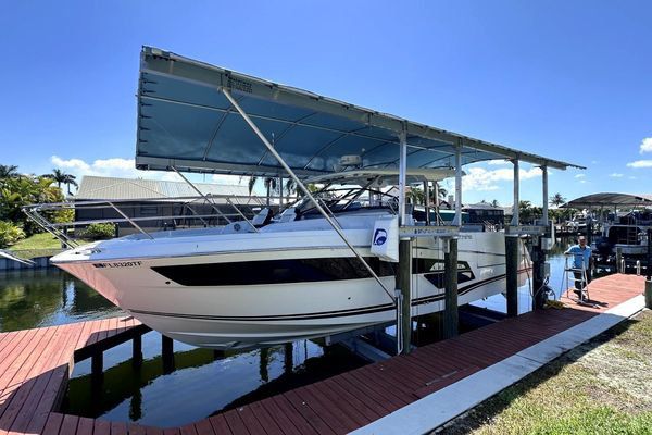 Triple Yamaha outboards on the transom.