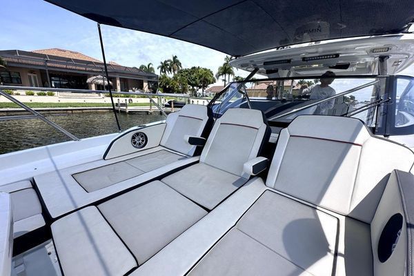 Full port side view of the yacht.