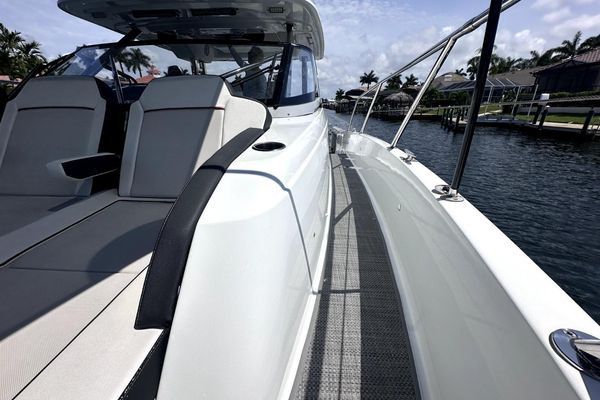 Starboard profile with walkaround deck access.