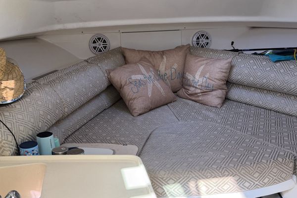 Rod holders and under-gunwale storage in the cockpit