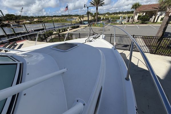 Starboard side view, highlighting the express cruiser design