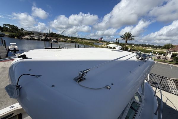 Cockpit seating area with comfortable cushions and seagrass mat