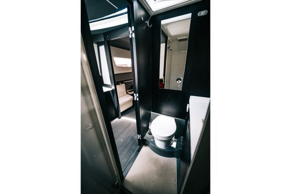 Luxurious master stateroom with abundant natural light.