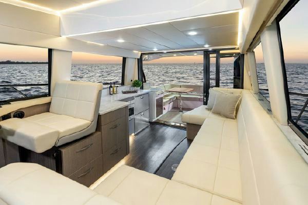 Aft cabin with king-sized berth and sofa.
