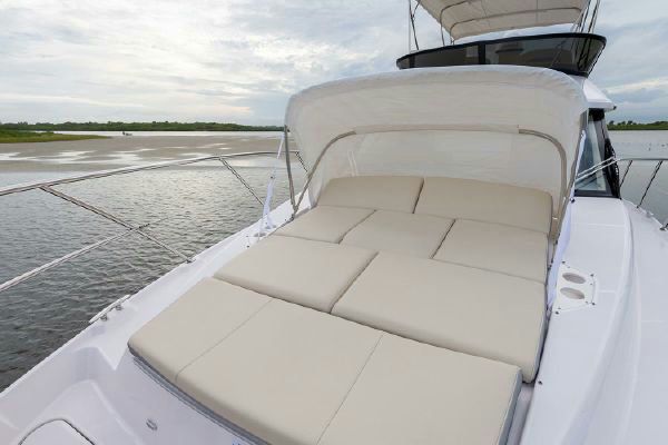 Stern view with extended swim platform and seating.